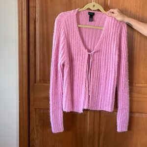 Pink fuzzy-textured cardigan